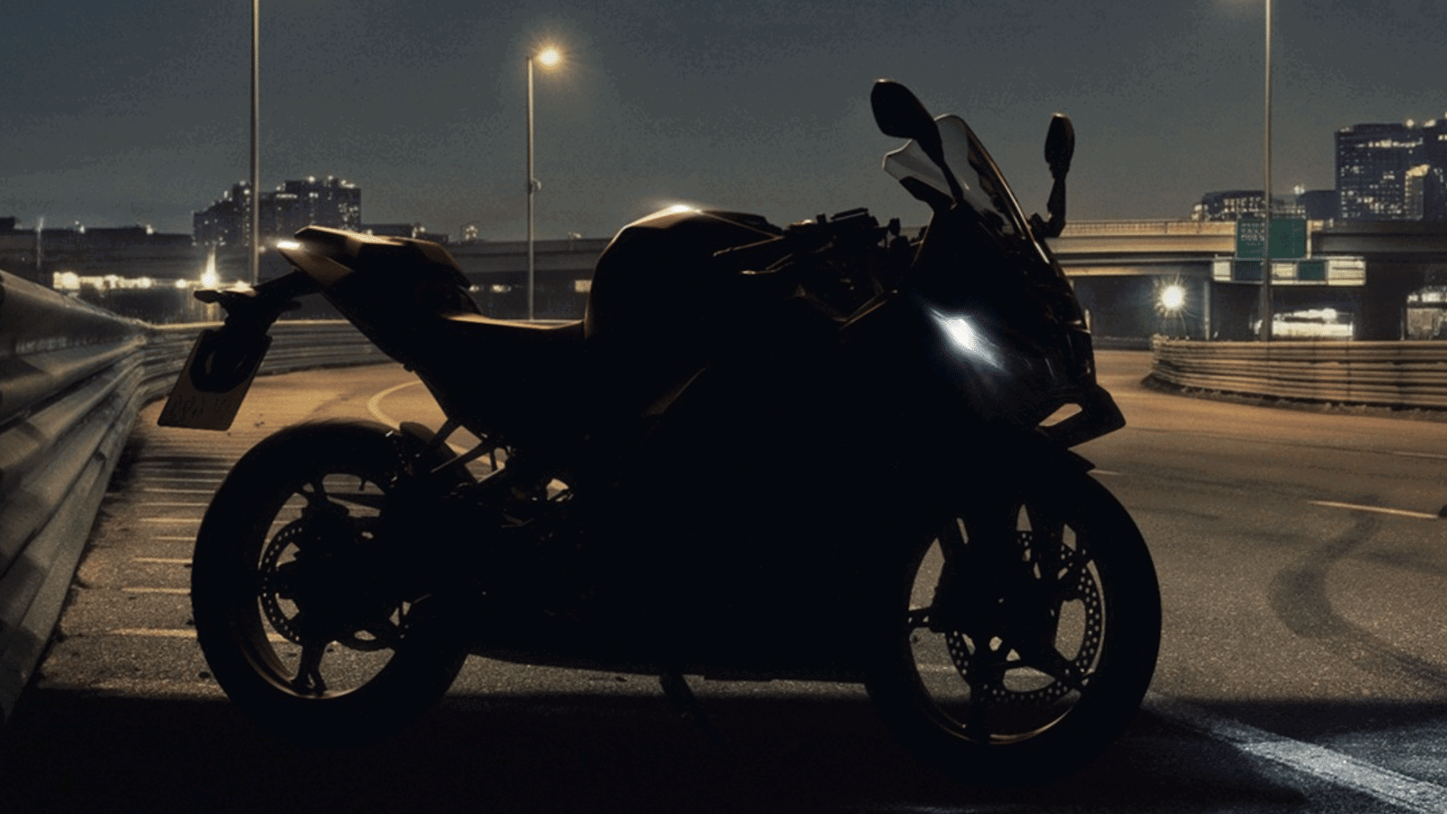 BMW teases a fully faired F450 sports bike ahead of October reveal